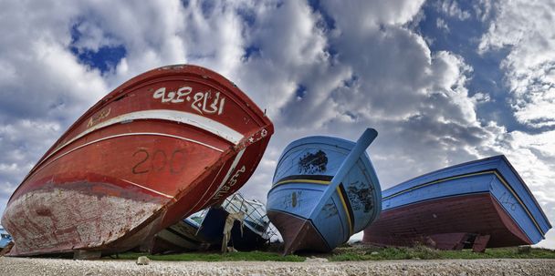 Old wooden fishing boats ashore - Photo, Image