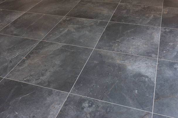 Newly laid floor tiles in the living room - Photo, Image