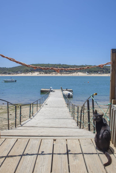 Vila Nova de Milfontes, little picturesque town on the Alentejo coast, Portugal. Pier of Maresia do Mira  - Photo, Image