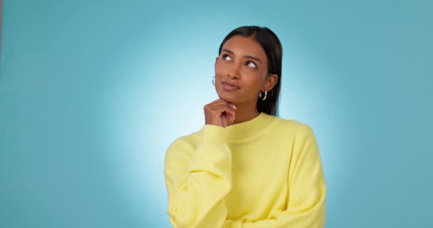 Happy, thinking and woman with idea or pointing hand to decision or solution in studio, mockup or blue background. University student, planning and presentation of problem solving, question or advice. - Footage, Video