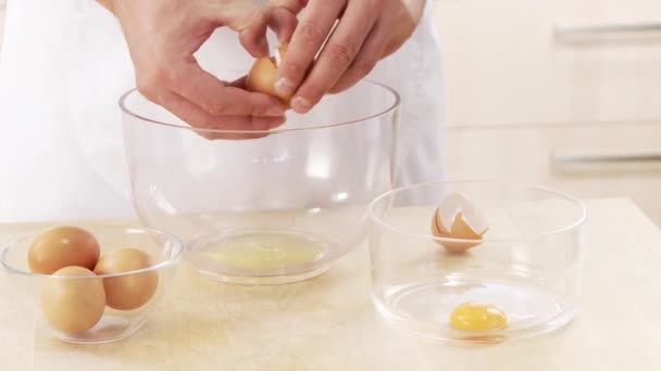 Eggs being separated into bowls - Footage, Video