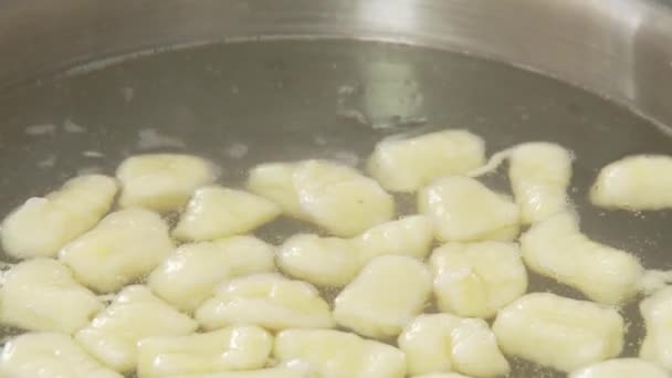 Gnocci being removed from salt water - Footage, Video
