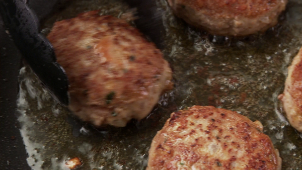 Meatballs fried in a pan - Felvétel, videó