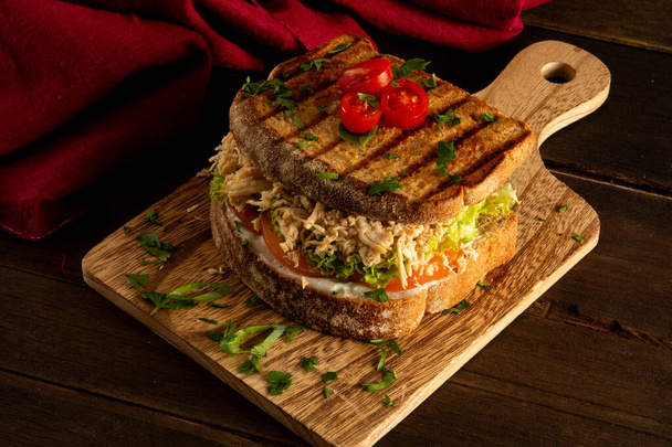 Chicken Breast Sandwich with Whole Grain Bread and Fresh Salad - Photo, Image