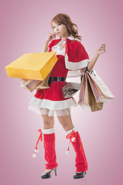 asiatique de Noël fille tenir shopping sacs
 - Photo, image