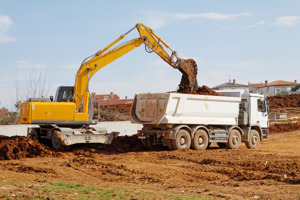 Excavator and tipper truck - Photo, Image
