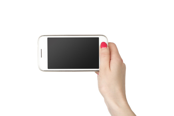 Telefon a kezében a lány. Fehér képernyő smartphone elszigetelt fehér background. - Fotó, kép