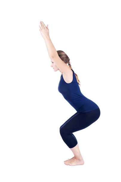 Yoga utkatasana chair powerful pose - Fotografie, Obrázek