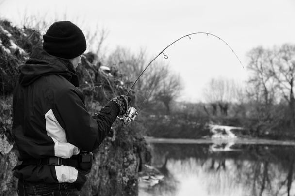 halász a folyóparton Bank - Fotó, kép