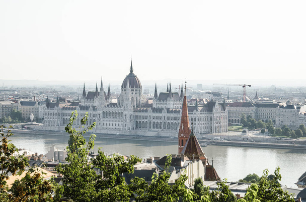 Budapest, Hungary, August 15, 2023. Panoramic view of Budapest Parliament from Buda side. - Photo, Image