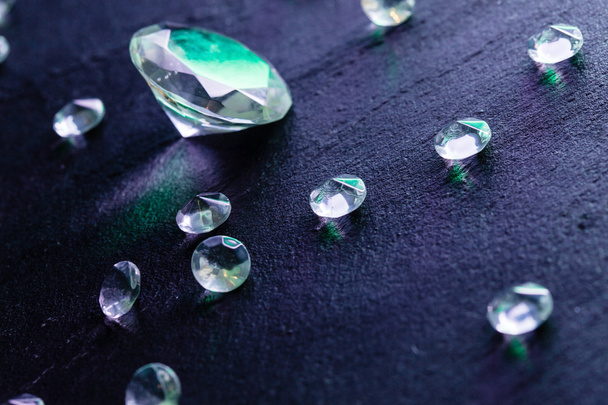 Different diamonds with purple light - Fotó, kép