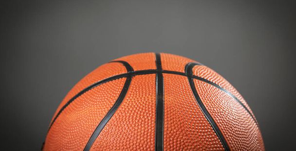 Basketball ball on the grey background. - Photo, Image