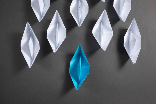 Blue and white paper boats. Business concept - Photo, Image