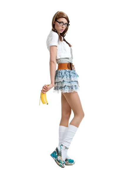 Sexual brunette posing with banana - Foto, Imagen