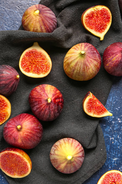 Ripe fresh figs on grunge blue background - Photo, Image