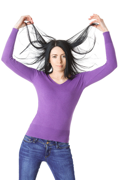 A woman in purple sweater isolated on a white background - Fotografie, Obrázek
