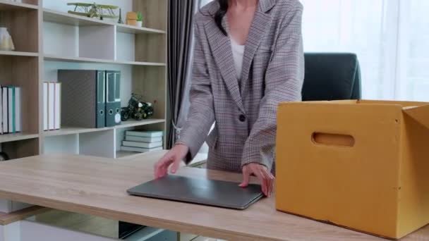 Portrait young business woman employee carrying cardboard box or belonging with frustrated and stress while fired from job with despair, businesswoman resign with hopeless, business and unemployment. - Footage, Video