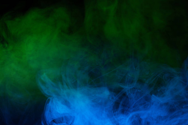 Blue steam on a black background. Copy space. - Photo, Image