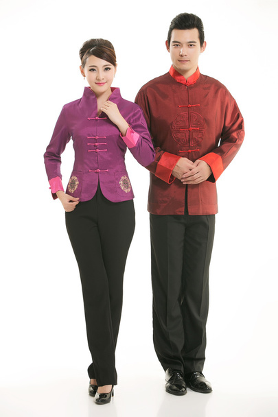Wearing Chinese clothing waiter in front of a white background - Foto, imagen