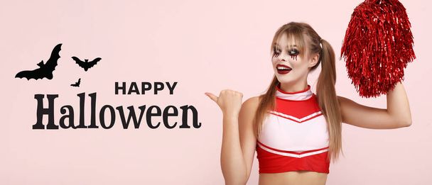 Mladá žena v halloween kostým na růžovém pozadí - Fotografie, Obrázek