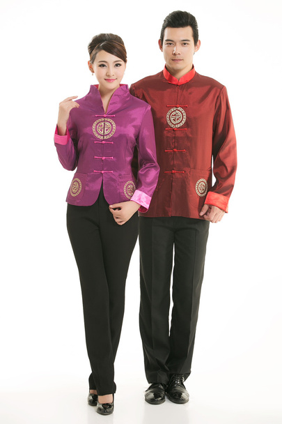 Porter un serveur de vêtements chinois devant un fond blanc - Photo, image
