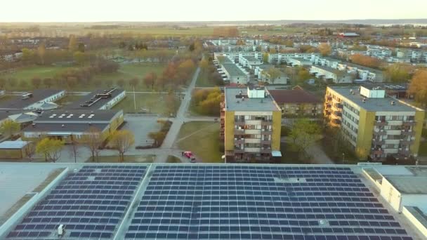 Producing of sustainable energy. Electric photovoltaic solar panels installed on shopping mall building rooftop for production of green ecological electricity. - Footage, Video