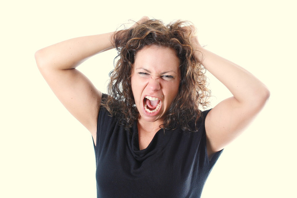 Молода жінка розлючена на волосся
 - Фото, зображення
