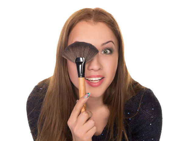 girl makeup artist with brushes for makeup  - Foto, afbeelding