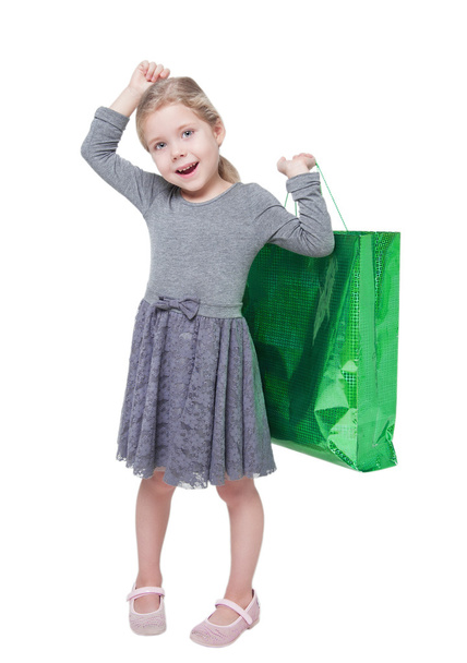 Beautiful little girl with shopping bag isolated  - Zdjęcie, obraz
