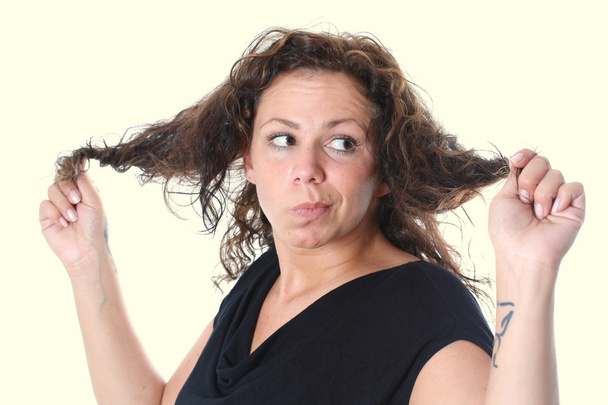 Молода жінка розлючена на волосся
 - Фото, зображення