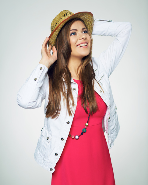 Woman in pink dress with hat - Foto, imagen