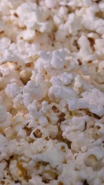 Cooking Popcorn popping on heated fry pan. Slow Motion. Making Popcorn Frying it in a Stove at Home. Exploding Popcorn Kernels over Hot Oil. High quality 4k footage - Footage, Video