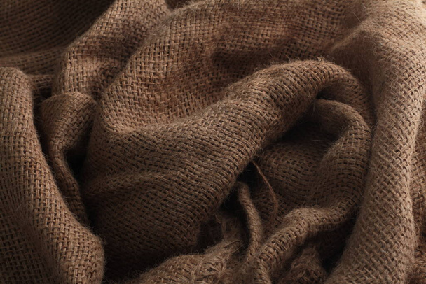 фон из трикотажной коричневой ткани - Фото, изображение