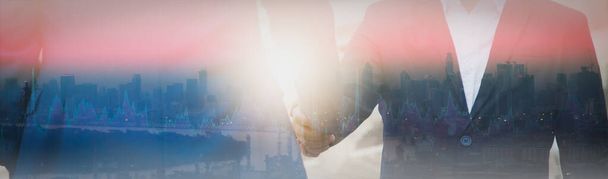 Smíšené mediální efekt Double exposure businessman handshake business deal to partner successfully negotiated and commercial cooperation and trade cityscape sturred background panoramic header banner - Fotografie, Obrázek
