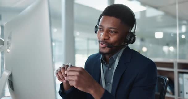 Computer, call center and happy black man talking, crm and technical support at help desk. Communication, customer service and sales agent consulting, telemarketing advisory and speaking to contact. - Footage, Video