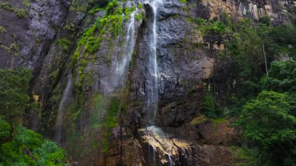 Diyaluma Falls in a mountain gorge in the tropical jungle. - Footage, Video
