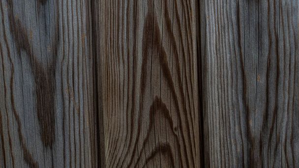 Una imagen cautivadora que muestra el intrincado patrón de grano y los tonos cálidos y terrosos de la madera natural. Esta textura de madera versátil es perfecta para varios proyectos de diseño de interiores y decorativos.. - Foto, Imagen