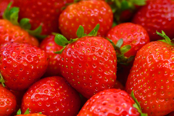 Close up view of a fresh ripe strawberries. Background. No people. - Photo, Image
