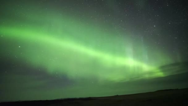 Spectacular scenery of green Northern lights illuminating dark sky in winter in Norway - Footage, Video