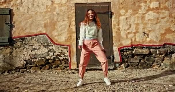Happy, woman and dancing in the street with hip hop, music and freedom in Brazil with streetwear, fashion or gen z style. Dancer, energy and creative performance mockup in summer with happiness. - Footage, Video