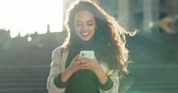 Outdoor, smile and woman with a smartphone, typing and contact with connection, lens flare or network. Person, city or happy girl with a cellphone, digital app or email notification with social media. - Footage, Video