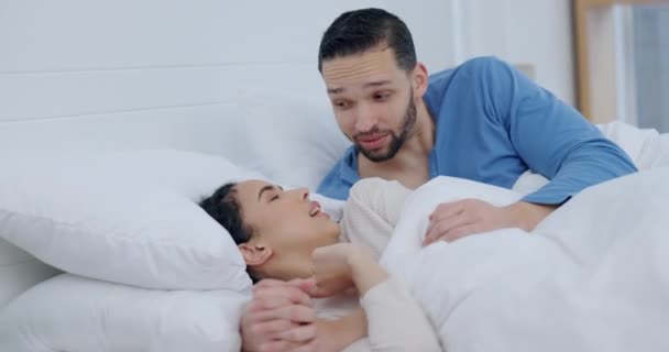 Bedroom, conversation and couple with love, relax and bonding with communication, apartment and wellness. Romance, man and woman in a marriage, bed and care in a home, discussion and understanding. - Footage, Video