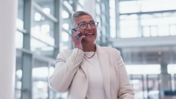 Walking, business deal or happy woman on a phone call talking, networking or speaking of ideas. Smile, mobile communication chat or mature entrepreneur in conversation or negotiation offer in office. - Footage, Video