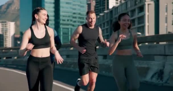 Group, race or people in city running on road for exercise, training or outdoor workout together. Sports fitness, runners or healthy friends on street for endurance, performance or cardio challenge. - Footage, Video