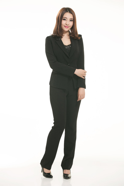 Young Asian women wearing a suit in front of a white background - Photo, Image