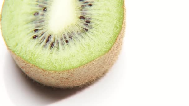 Mitad giratorio kiwi fruta
 - Imágenes, Vídeo