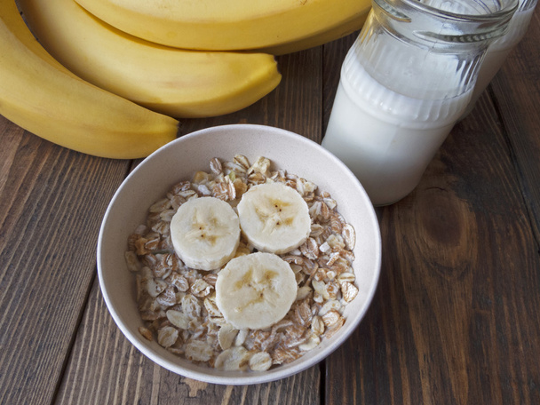 oat porridge with bananas and yogurt - Photo, Image