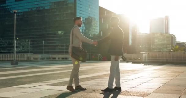 Teamwork, greeting or business people shaking hands in city for project agreement or b2b deal. Hiring, outdoor handshake or men meeting for a negotiation, offer or partnership opportunity on rooftop. - Footage, Video