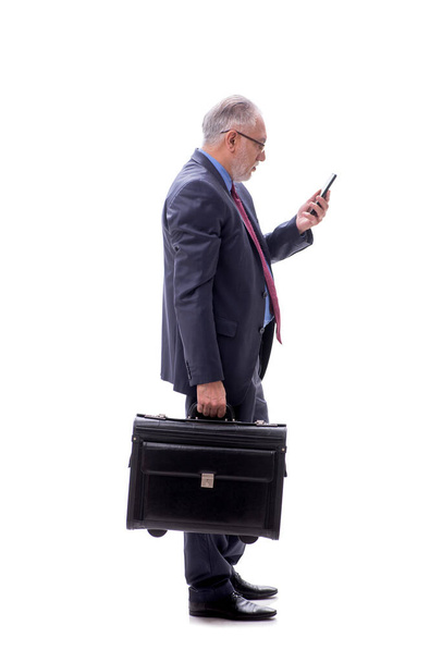 У віці бізнесмен з валізою ізольовані на білому - Фото, зображення