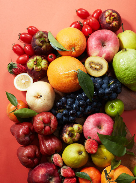 Closeup, a wide variety of fruits background - Photo, Image
